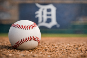 A close-up of a baseball on the field at Comerica Park.