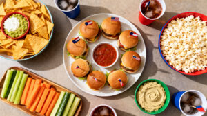 Food and drinks spread laid out for a World Cup 2026 watch party at home