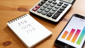 Calculator and notes representing the math behind sports betting odds"