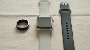 Collection of wearable sleep tracking devices including a ring, watch, and band"