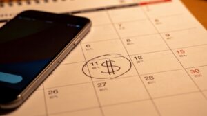 Notebook with a budget written down, representing responsible gambling practices"