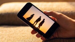 Person watching a vertical short drama on their smartphone"